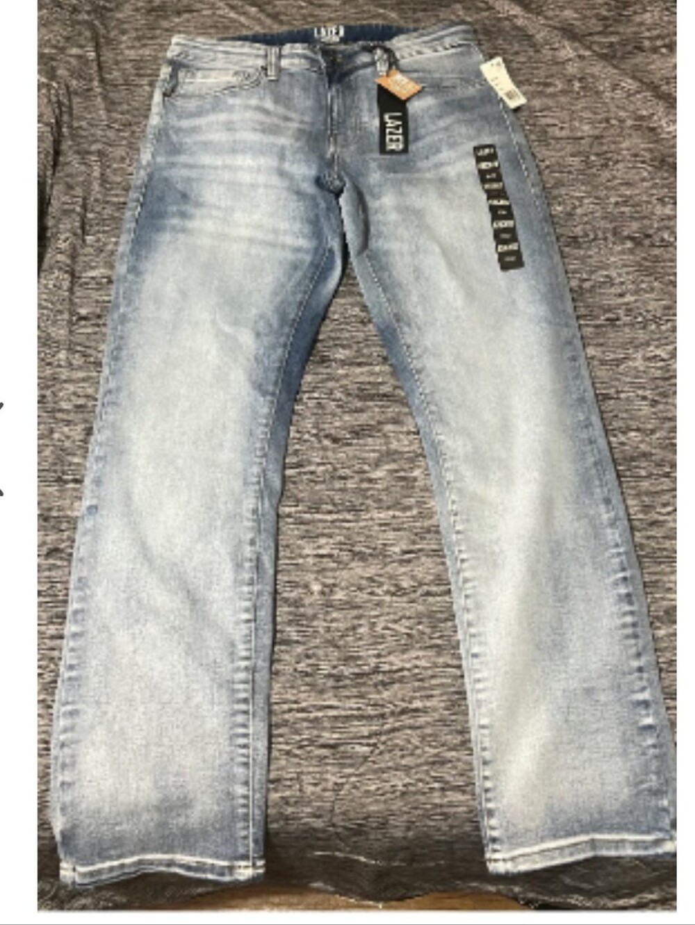 Lazer Jeans in a light-wash blue denim, slim-fit style, size 32x30. Gift. NWT